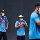 Bangladesh’s cricket coaching team fight the smog during practice on Nov. 1 in New Delhi.